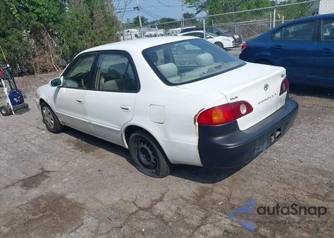2001 Toyota Corolla Le из США, поврежденный, VIN 2T1BR12E81C451844